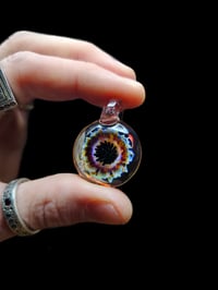 Psychedelic sunflower pendant. 