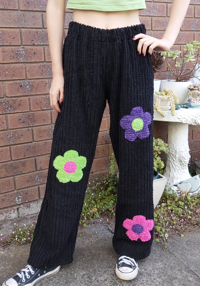 Image of Black chenille pants with Flowers