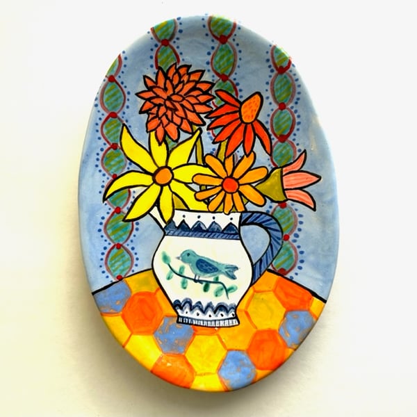 Image of 30 Blue Platter with Hexie Tablecloth with Multicolor Flowers 2023