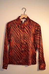 Image 1 of not KEEPING UP WITH THE JONES'