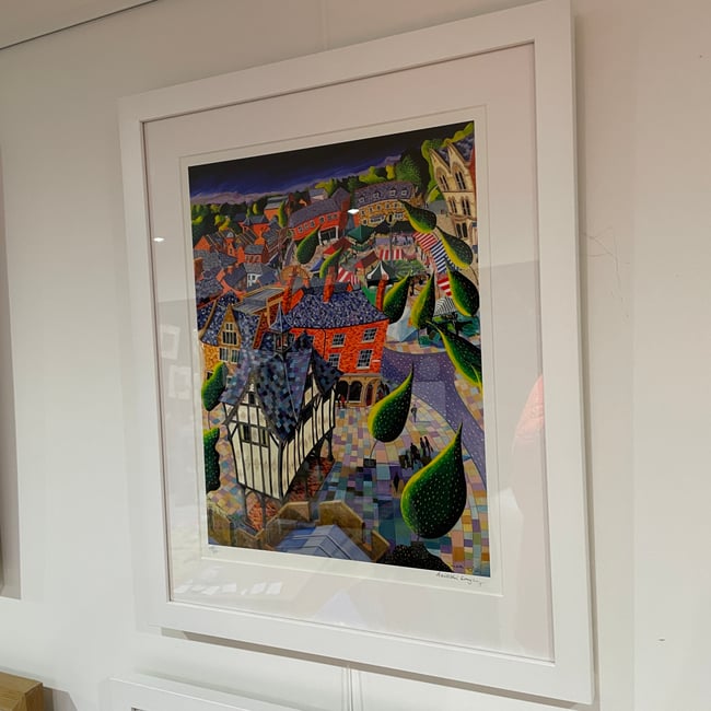 Framed Print of "Market Harborough Old Grammar School and Farmers Market"