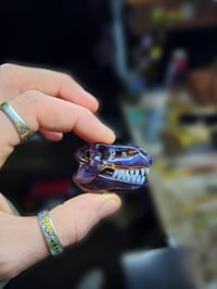 Image 3 of Chocolate opal T-Rex skull pendant. 