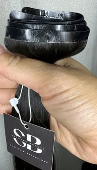 Straight seamless clip-In extensions