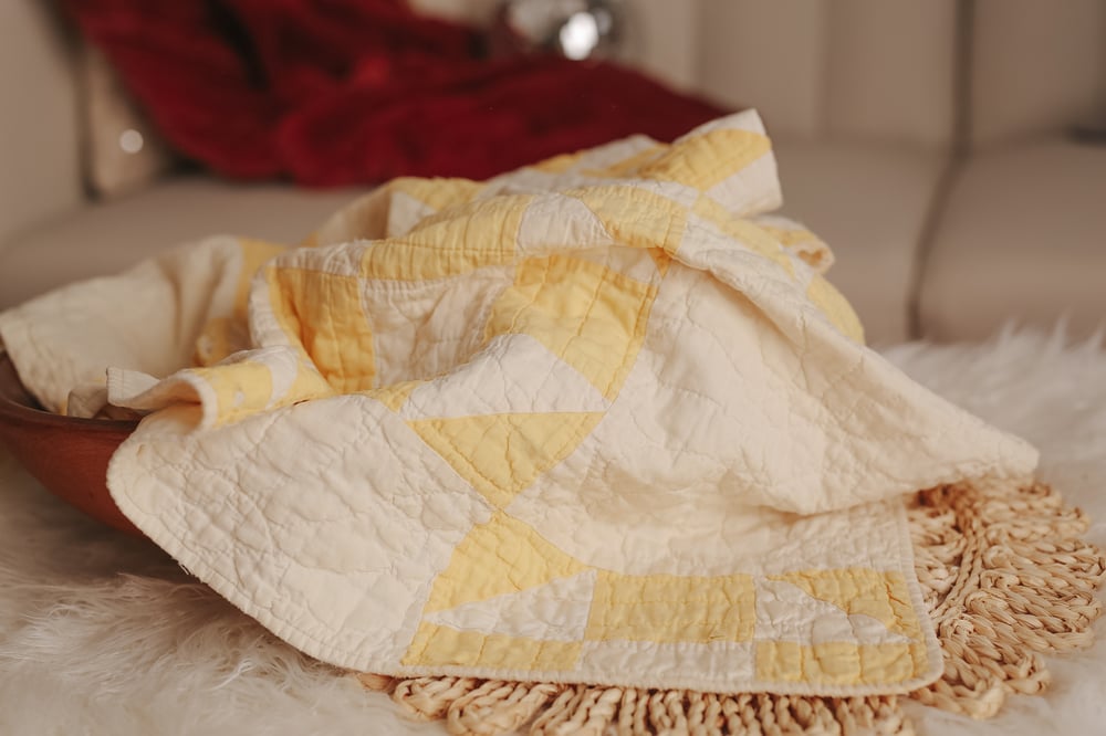 Image of vintage yellow & cream quilt piece