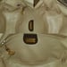 Image of Vtg Gucci Brown Monogram crossbody bag.