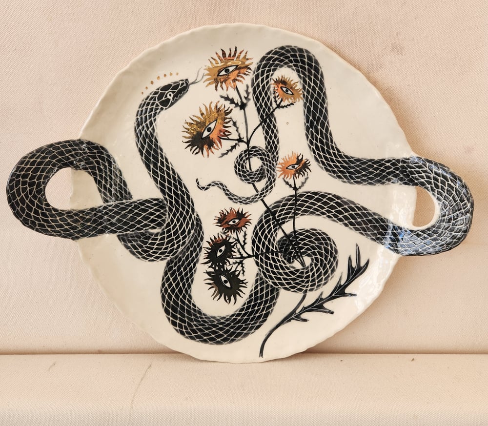 Image of Serpent handled platter with eye flowers