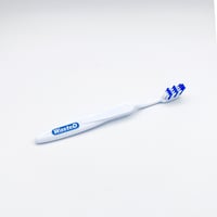 Image 1 of Wasted Toothbrush White