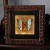 Morpho butterfly in a backlit frame