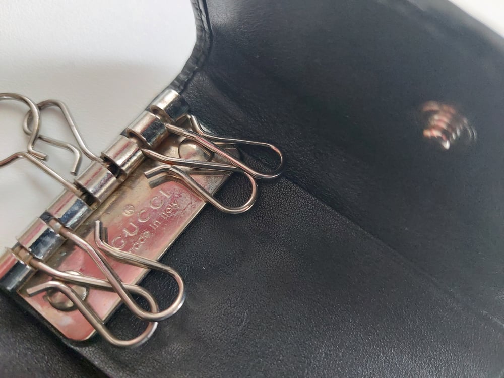 Image of Gucci GG monongram black leather keyholder keychain