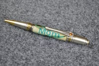 Image 1 of Turquoise Lettered Feather Pen that says Mom  # 094
