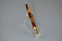 Image 4 of Segmented Wood Pen with Herringbone 360 Design that Features a Redheart and Maple Celtic Knot  #0600