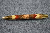 Image 5 of Segmented Wood Pen with Herringbone 360 Design that Features a Redheart and Maple Celtic Knot  #0600