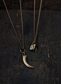 Image 3 of Brass claws and teeth