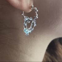 Image 1 of Boucles à bulles