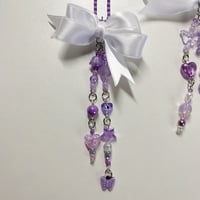 Image 3 of purple ribbon keychains