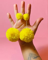 Image 4 of single color double pom pom earrings