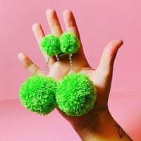 Image 2 of single color double pom pom earrings