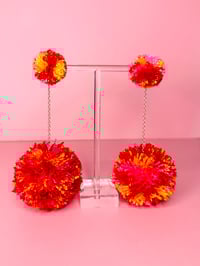Image 3 of multi color double pom pom earrings