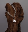Stamped Heart Charm on Silver Bracelet