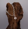 Stamped Heart Charm on Silver Bracelet