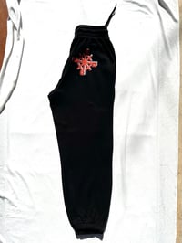 Image of early riser sweatpants in black 