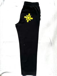 Image of son of the sun sweatpants in black 
