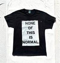 Image of none of this is normal tee in black 