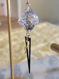 Image 4 of Big Reputation d4 dice earrings