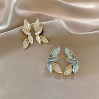 Image 3 of White & Gold Fairy Leaf Earrings 