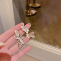 Image 2 of White & Gold Fairy Leaf Earrings 