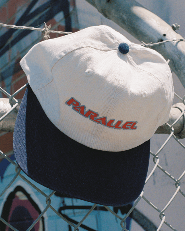 TEXT CAP // NAVY ECRU <p><del>$40.00</del> 