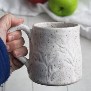 Image of Satin White Speckled Stoneware Mug, Hand Carved Floral Design, Made in USA