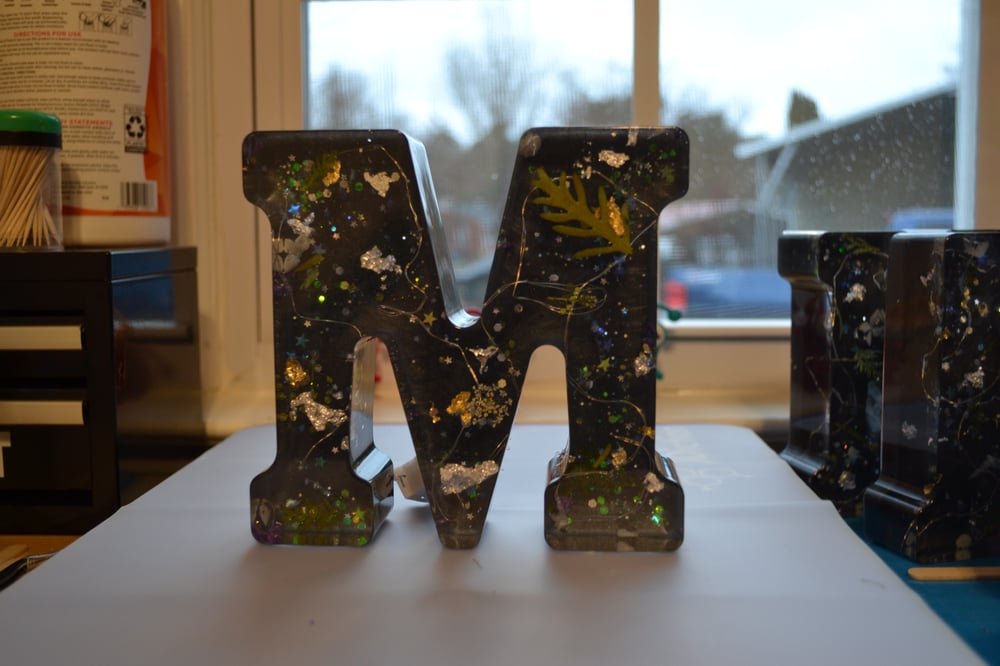 Image of Lighted "M" 