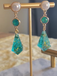 Image 2 of Ocean Glimmers d4 dice earrings