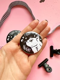 Image 2 of Catch the Night - Cat badge with a vinyl sticker