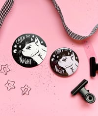 Image 1 of Catch the Night - Cat badge with a vinyl sticker