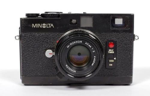 Image of Minolta CLE 35mm camera with M rokkor 40mm and 28mm lenses **UGLY** WORKS