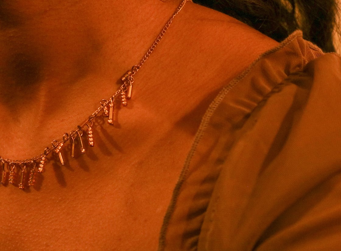 Image of gold dangly drop chain