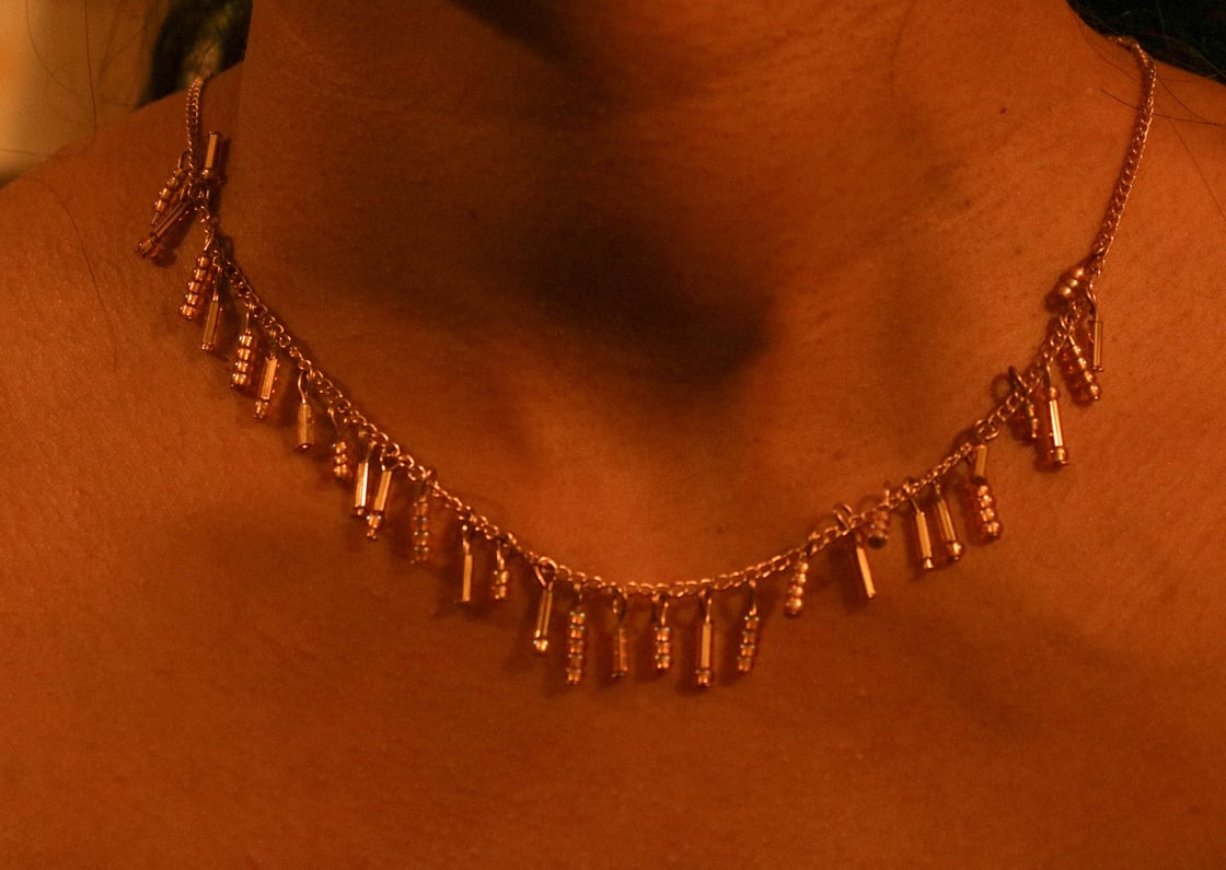 Image of gold dangly drop chain