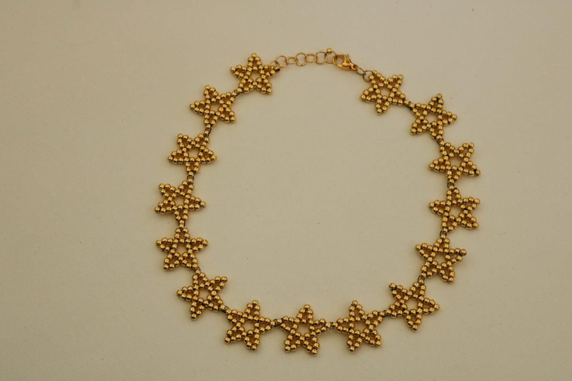 Image of gold star necklace