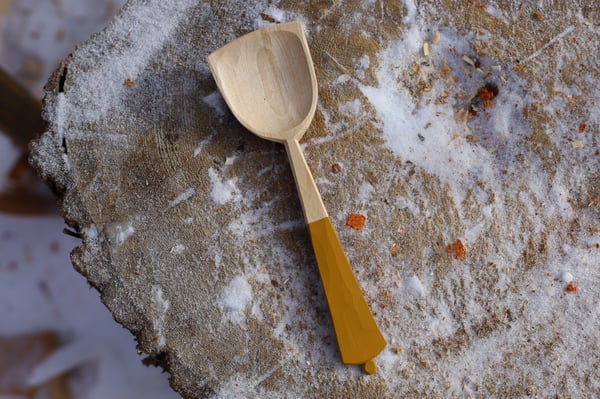 Image of Small yellow serving spoon
