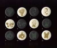 Image 1 of charm buttons
