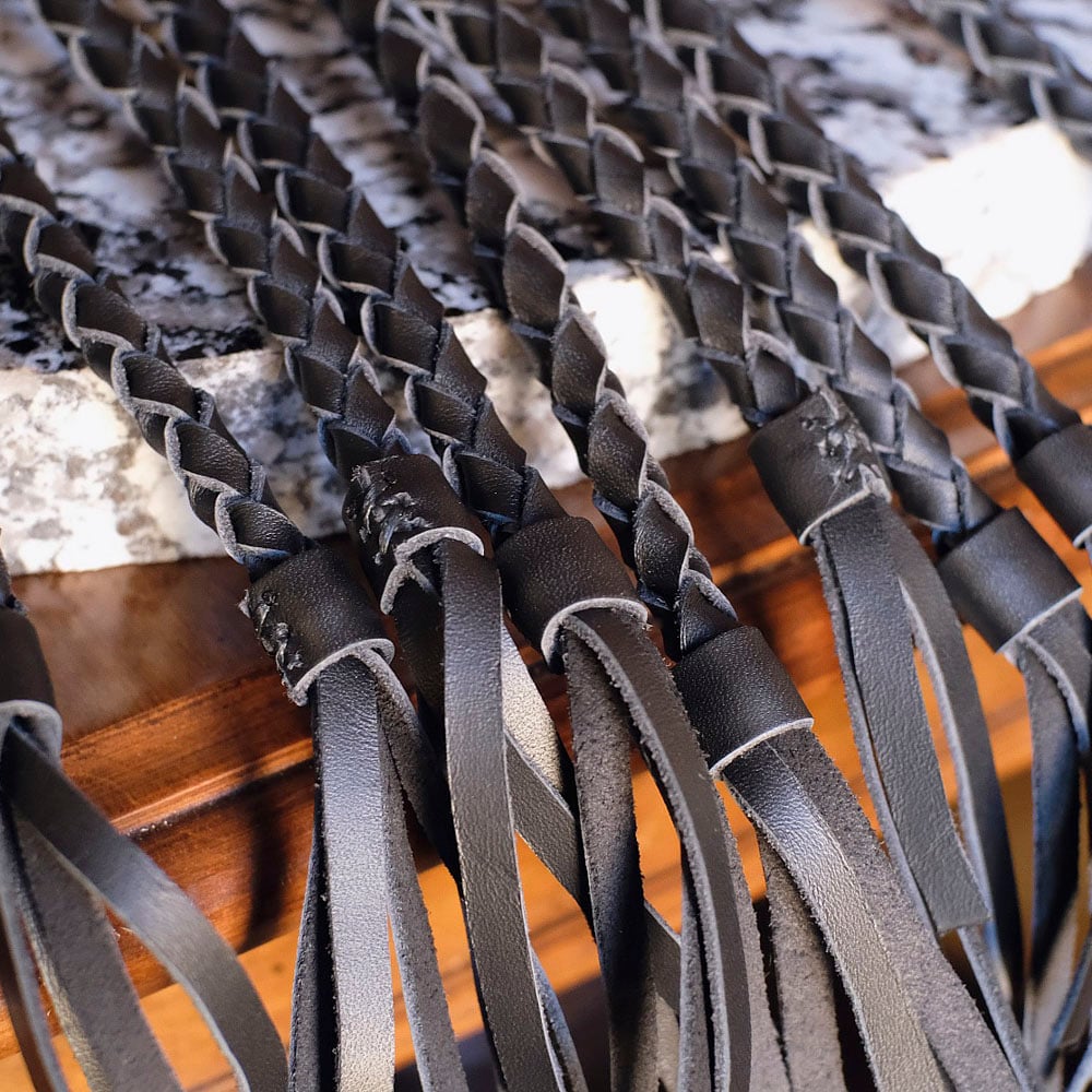 Braided leather flogger