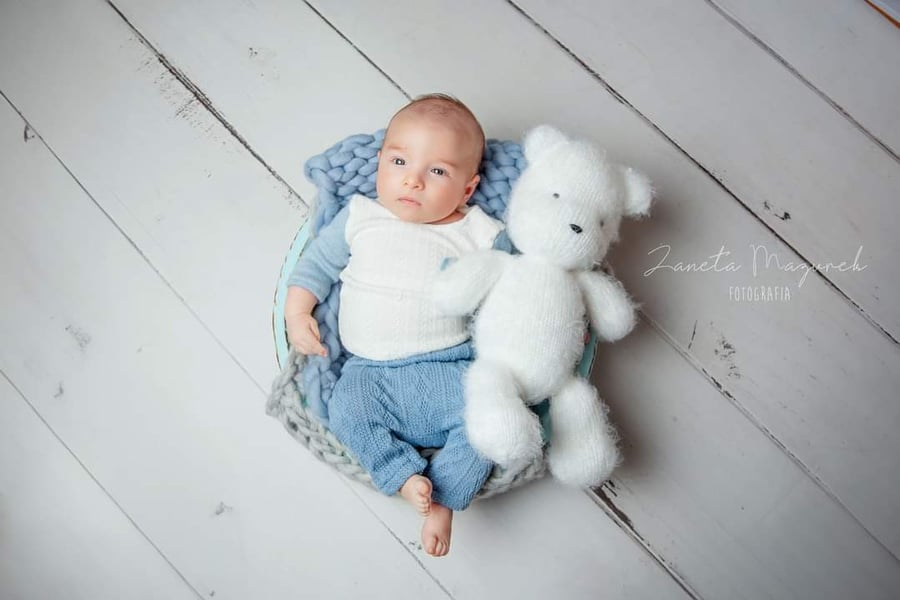Image of Fluffy knitted teddy bear or bunny. Newborn