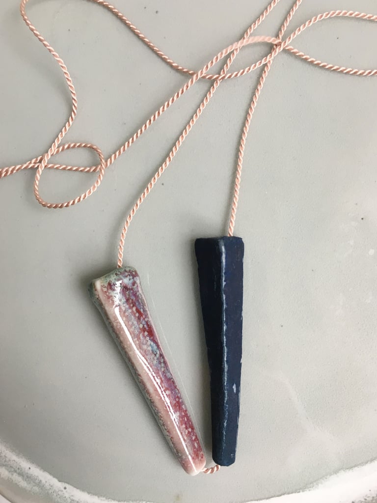 Porcelain necklace, silk chord in petal, Chun red glaze and blue oxide stain Image 3
