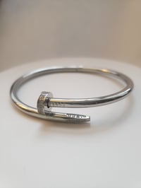 Image 3 of Cuffing Silver