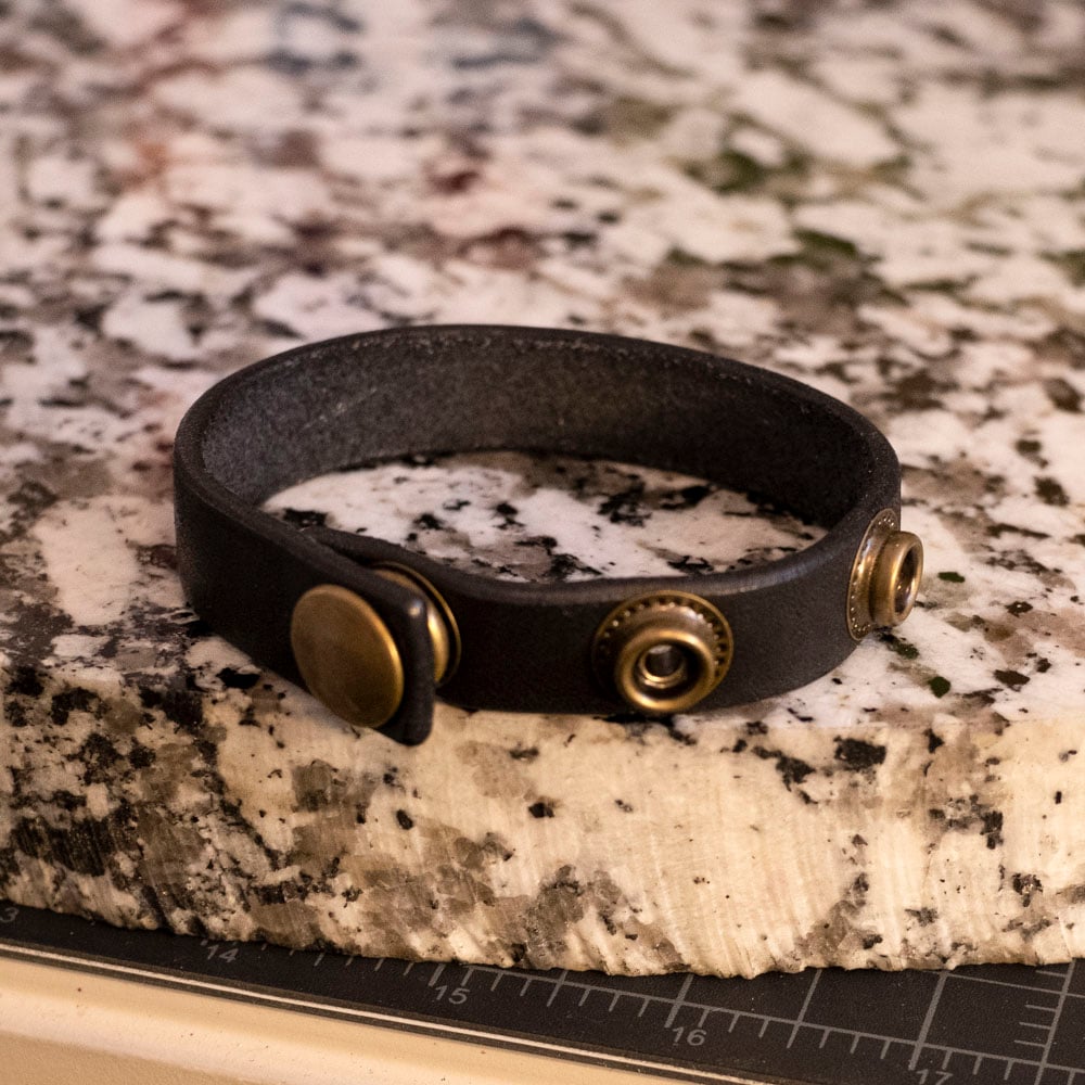 Snap-on leather cock ring