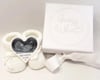 Pregnancy announcement box booties and heart shaped scan 