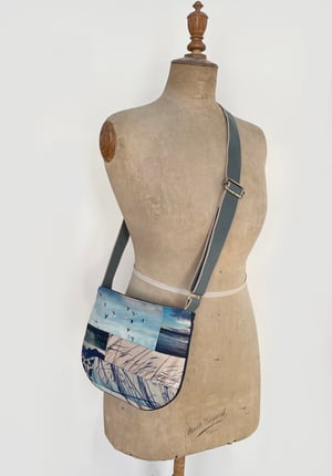 Image of Birds + reeds, curved shoulder bag with cross-body strap