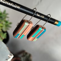 Image of stripy dangly recycled pencil earrings